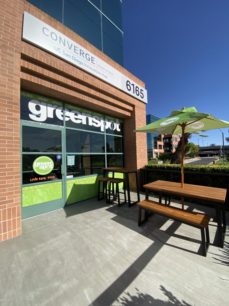 governor park patio with table, chairs and umbrella